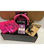 The Ernie Ball & D'Addario Pink Guitar Player Gift Bundle